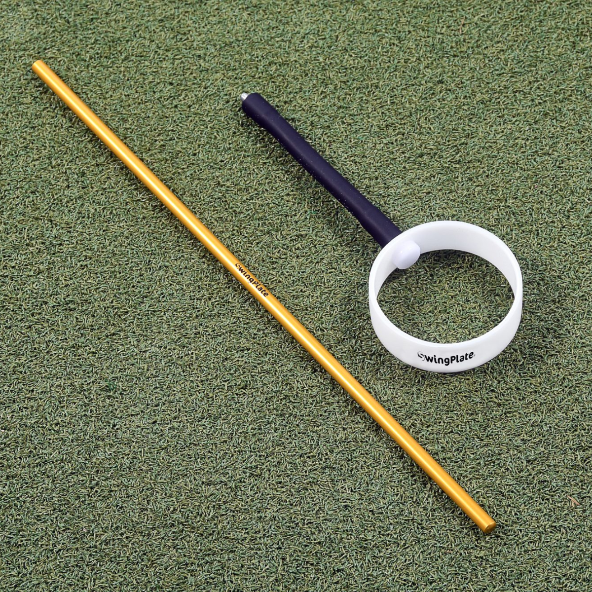 Yellow aluminum section rod and the Swing Eye on a green grass background