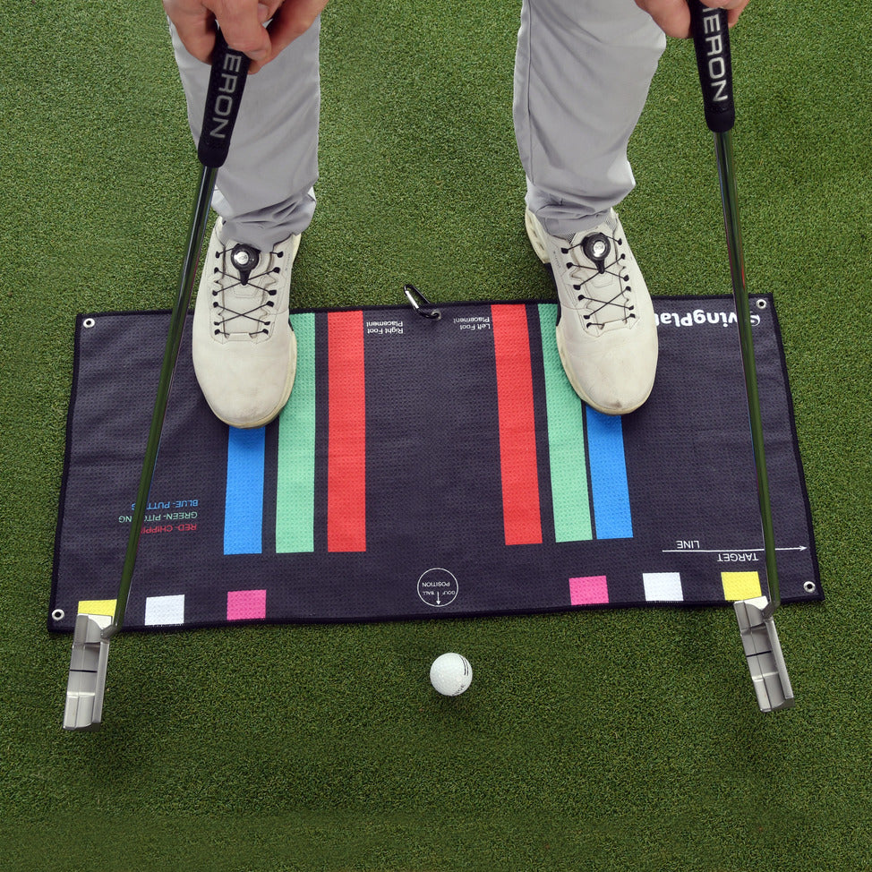 Swing Plate stance towel training aid for golf setup and ball position alignment
