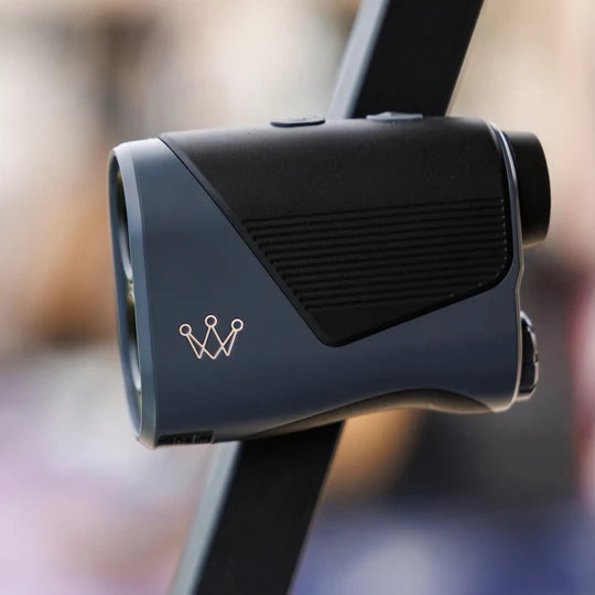 Arccos Smart Laser rangefinder with a brand logo showing magnetic attachment to a golf cart