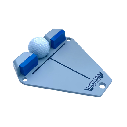 Putting training aid with a golf ball on a white background