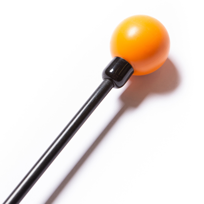 Black Orange Whip stick with an orange ball on a white background