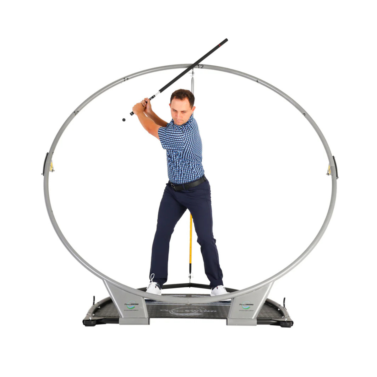 Man practicing golf swing on the PlaneSWING with a white background