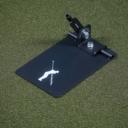 The Swing Plate on a green surface