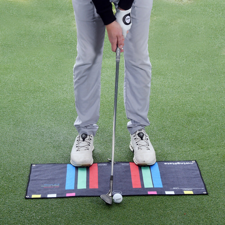 Swing Plate stance towel training aid for golf setup and ball position alignment

