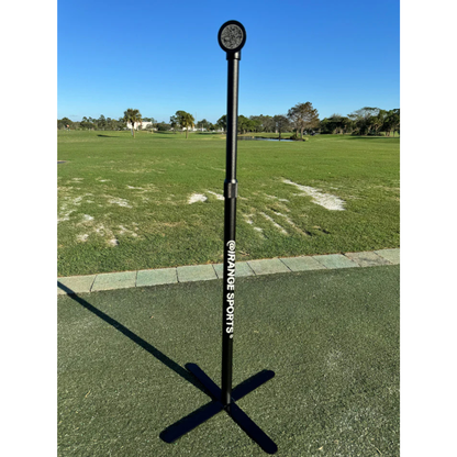 Black stand with a device on top in an outdoor setting