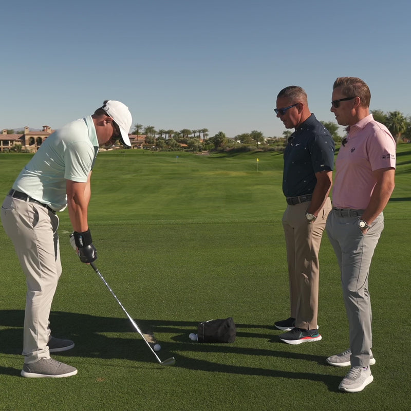 David Woods and Sean Foley on the course guiding a golfer who is using a ProSENDR to improve his swing